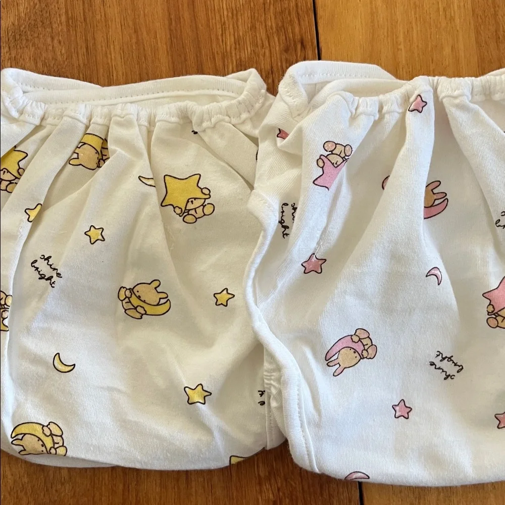 White Baby Cloth Diaper Covers with Yellow and Pink Prints